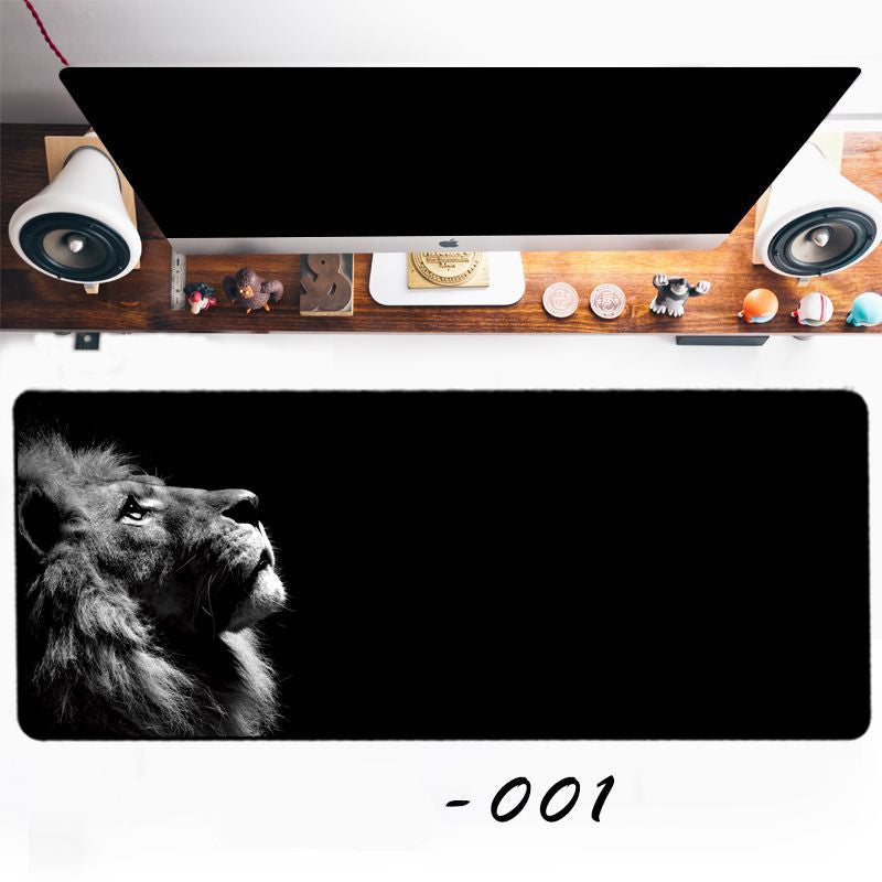 Lion computer mouse pad styled on a bold August study desk