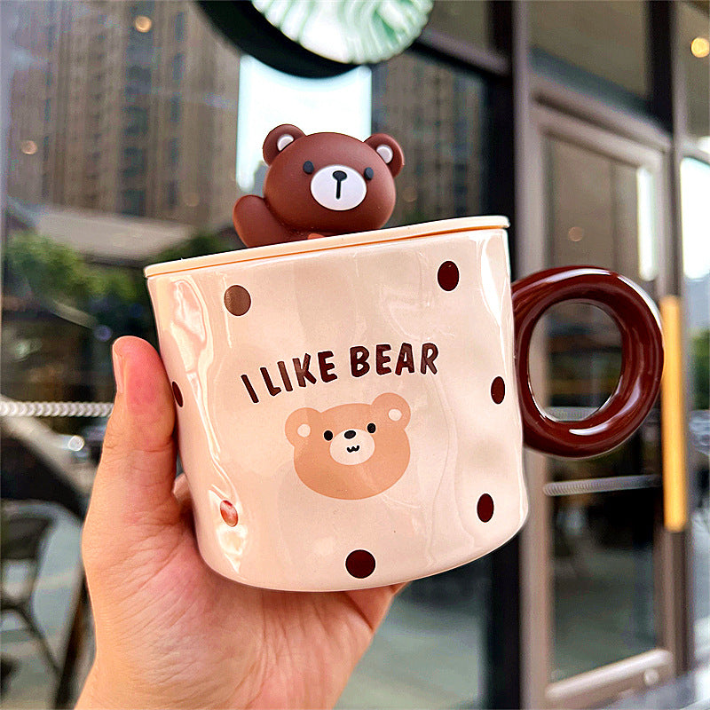 A charming Little Bear ceramic mug with lid for student mornings